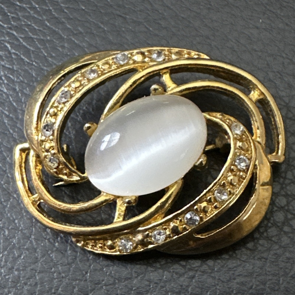 Vintage Rhinestone White Cabochon Brooch Pin Gold Tone Swirl Design Signed AAi